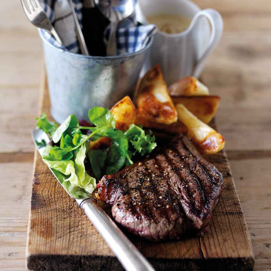 Beef Steak with Peppercorn Sauce & Potato Wedges
