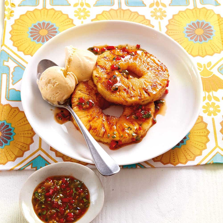 Pineapple with Hot Passion Rum Sauce