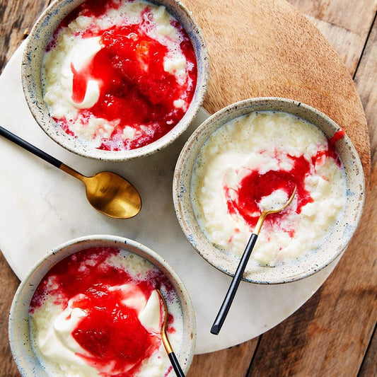 Creamy rice pudding with plum compote